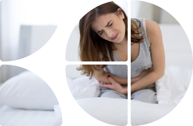 Frau mit Bauchschmerzen